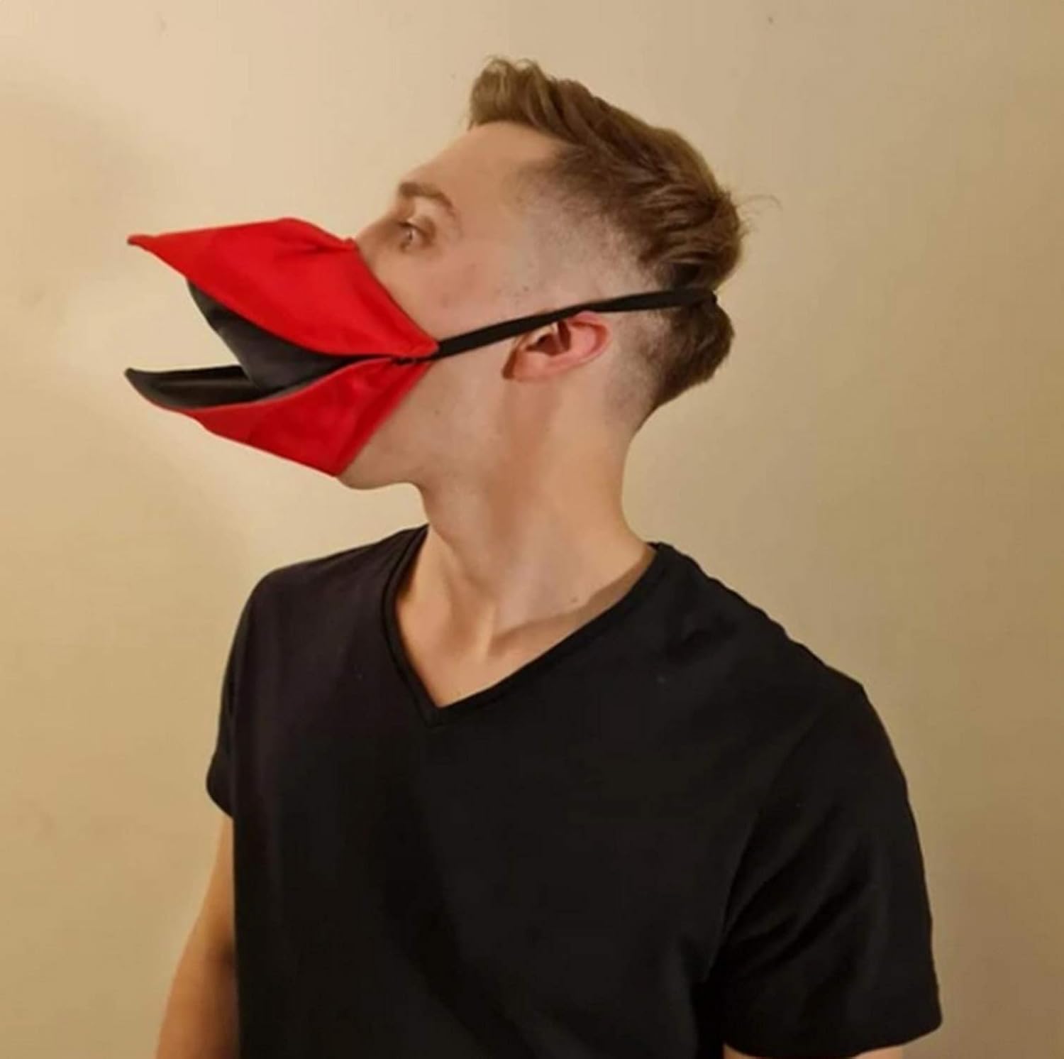 Party Animal Duck Face Covering — WeirdThingsToBuy weird find