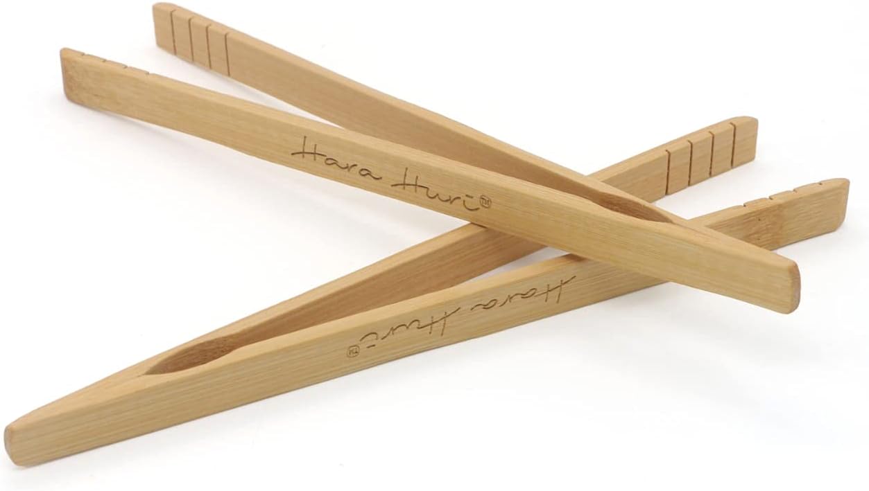 Unnecessary Bamboo Toaster Tongs — WeirdThingsToBuy weird find